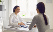 female doctor talking with patient around the office